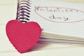 Red heart and text valentines day in a notebook, filtered