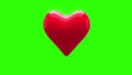 Red heart thumping on green background