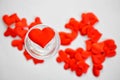 Red heart in a transparent glass filled with water. St. Valentine`s Day Royalty Free Stock Photo