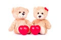 Red heart and two teddy bears sit on white background. Love and relationship concept. Valentines concept Royalty Free Stock Photo