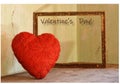 The red heart for Valentine`s Day escapes from the frame