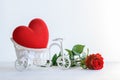 Red Heart in vintage bicycle basket Royalty Free Stock Photo