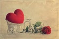 Red Heart in vintage bicycle basket Royalty Free Stock Photo