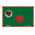 Red heart on white circle and text love on blackboard. Royalty Free Stock Photo