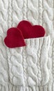 Red heart on a white knitted background, knitted texture Royalty Free Stock Photo