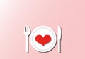 Red heart on white plates with white cutlery, Love concept.