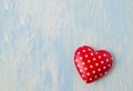 Red heart with white polka dot pattern on blue vintage wooden ba Royalty Free Stock Photo