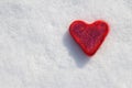 Red heart on the white snow. Royalty Free Stock Photo