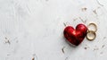 Red heart on a white wedding background with two golden rings created with Generative AI Royalty Free Stock Photo