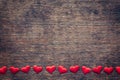 Red heart on wood background with space for Valentine Day. Royalty Free Stock Photo