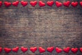 Red heart on wood background with space for Valentine Day. Royalty Free Stock Photo