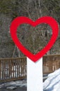 Red Heart Wood Sign at a Tourist Destination in Winter