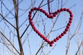 Red heart of wooden beads