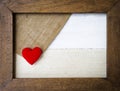 Red heart in wooden frame Royalty Free Stock Photo