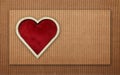 Red heart wooden shaped on cardboard