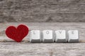 Red heart and word LOVE written on keyboard keys Royalty Free Stock Photo