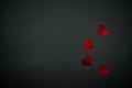 Red hearts and black background