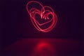 Red hearts on a black background for your valentine, long exposure photograph