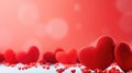 red hearts on red bokeh background, valentines day love concept with copy space Royalty Free Stock Photo