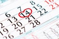 Red hearts on calendar with marked date of Valentines Day Royalty Free Stock Photo