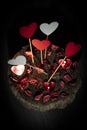 Red hearts and candles on wooden background Royalty Free Stock Photo