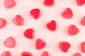 Red hearts candy on soft pink background, pattern. Valentine day abstract background. Royalty Free Stock Photo