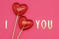 Two lollipops. Red hearts. Candy. Love concept. Valentine day Royalty Free Stock Photo