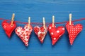 Red hearts with clothespins Royalty Free Stock Photo