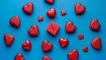 Red hearts and gift box on blue background Royalty Free Stock Photo