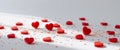Red Hearts and Glitter with a Bright Empty Background. Royalty Free Stock Photo