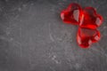 Red hearts on a gray background. The symbol of the day of lovers. Valentine's Day. Concept February 14. Royalty Free Stock Photo