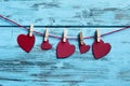 Red hearts hanging in a clothes line Royalty Free Stock Photo