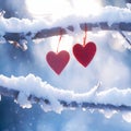 Red hearts hanging on a snowy branch Winter love story Royalty Free Stock Photo