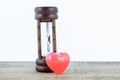 Red hearts and hourglass Royalty Free Stock Photo