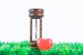 Red hearts and hourglass Royalty Free Stock Photo