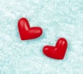 Red hearts on the ice Royalty Free Stock Photo