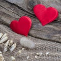 Red hearts on natural wooden and burlap background. ValentineÃ¢â¬â¢s day greeting card. Eco concept Royalty Free Stock Photo