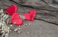 Red hearts on natural wooden and burlap background. Valentines day greeting card. Eco friendly concept Royalty Free Stock Photo