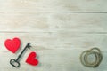 Red hearts and old iron key to lock. valentines day message. Royalty Free Stock Photo