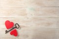 Red hearts and old iron key to lock. valentines day message. Royalty Free Stock Photo