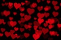 Red hearts seamless pattern on dark background Royalty Free Stock Photo