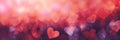 Red hearts, sparkling glitter bokeh background texture. Holiday valentines day lights. Abstract defocused header. Wide Royalty Free Stock Photo