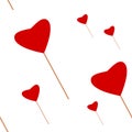 Red hearts on stick seamless pattern.