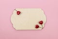 Red Hearts surround a blank antique wooden tablet on the pink background. concept of Saint Valentines day love