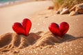 Red hearts together on the beach, showing holiday summer romance