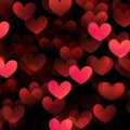 Red hearts valentine day defocused bokeh lights on a black background Royalty Free Stock Photo