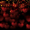 Red hearts valentine day defocused bokeh lights on a black background with yellow sparkles Royalty Free Stock Photo