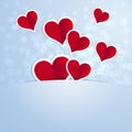 Red hearts with a white inking on a blue background