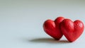 Red hearts on a wooden-stone white background. A realistic element that denotes love, health, care for yourself and Royalty Free Stock Photo