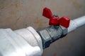Red heating radiator valve close up Royalty Free Stock Photo